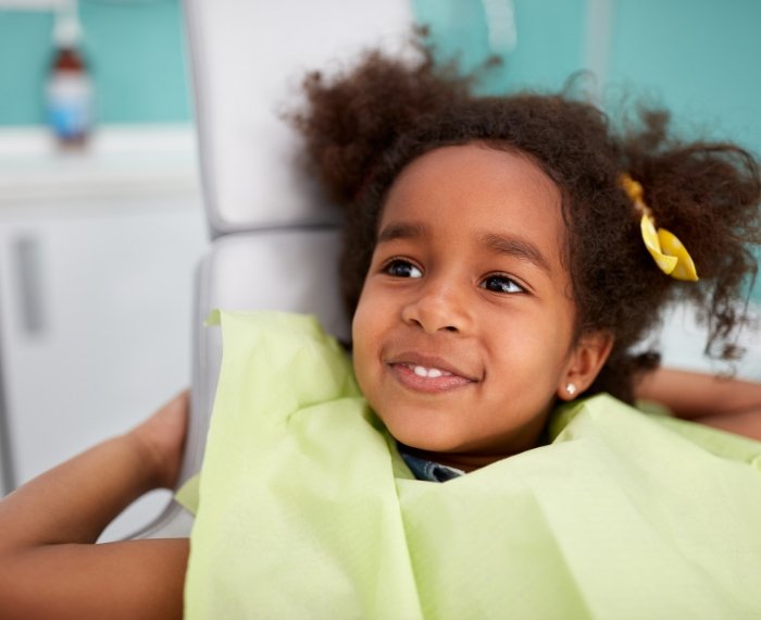 Child smiling during phase one pediatric orthodontics visit
