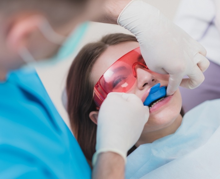 Child receiving fluoride treatment