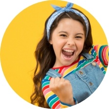 Smiling girl in overalls