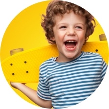 Child in striped shirt smiling