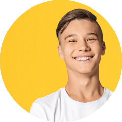 Young man smiling after dentistry for teens