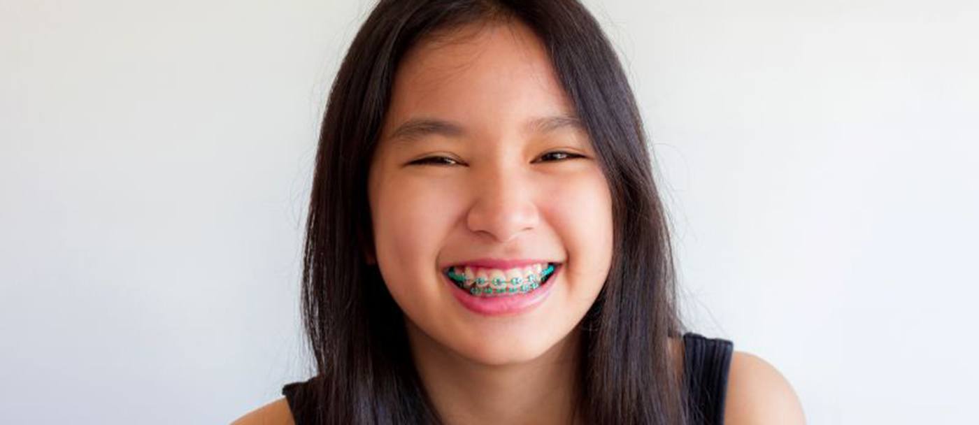 Portrait of teen girl with braces