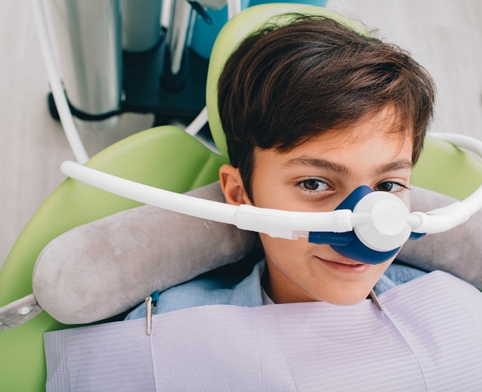 Child receiving nitrous oxide sedation dentistry