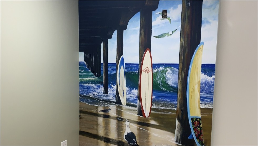 Surfboards on dental office wall