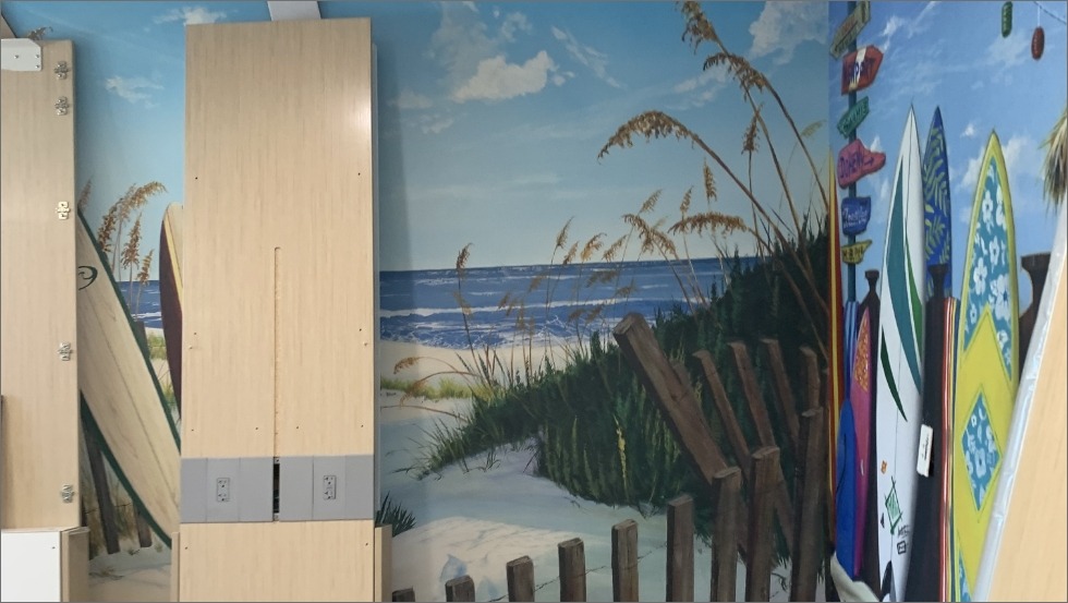 Beach view mural on dental office wall