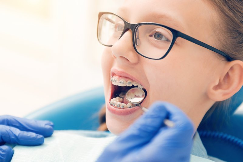 A child in the orthodontist’s chair about to undergo orthodontic treatment